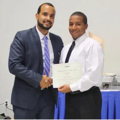 Year Up era: Carlos with young adults in workforce training