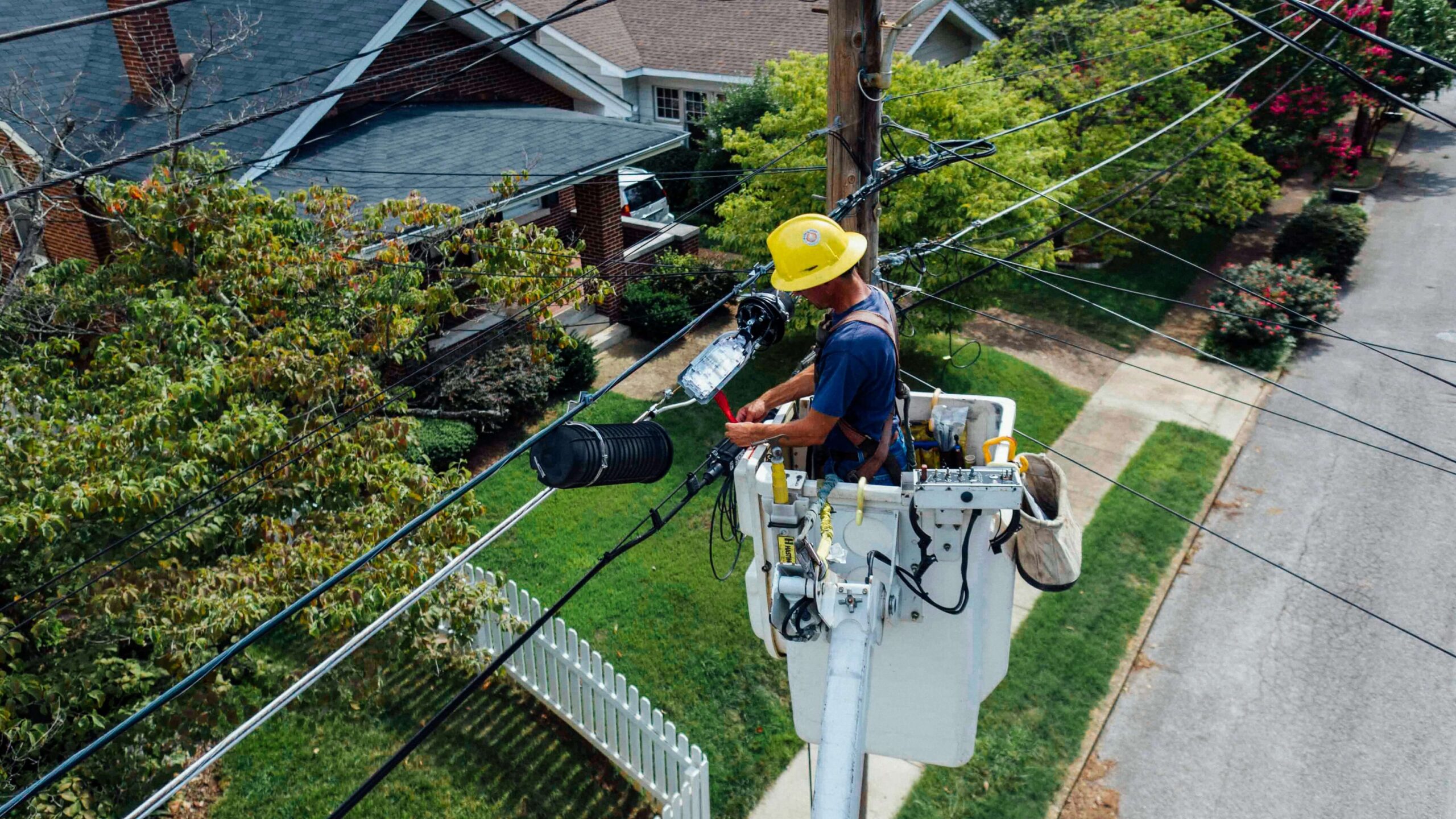 electrician_2_hero An experienced electrician working on power lines.