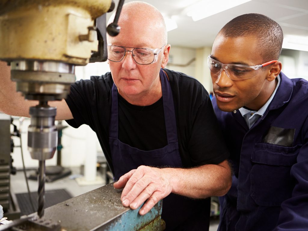 A mentor and apprentice at work.