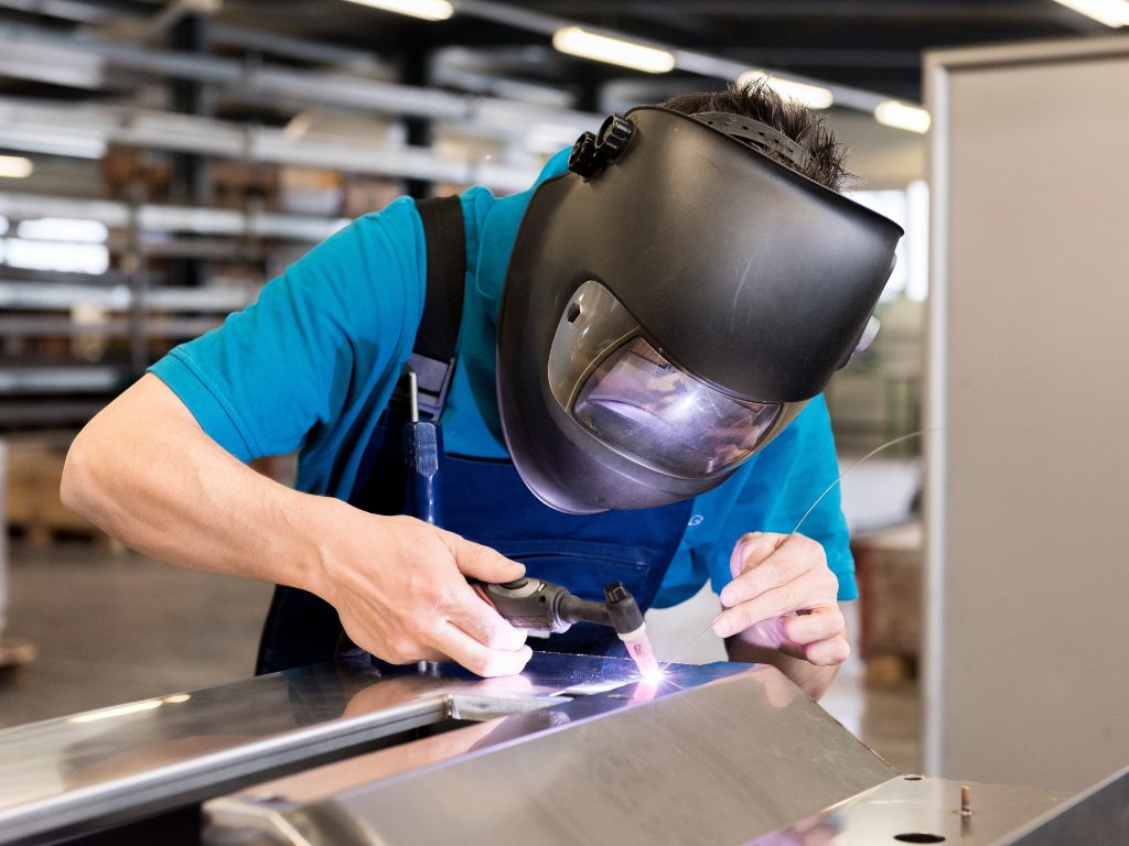 A welding apprentice hard at work.